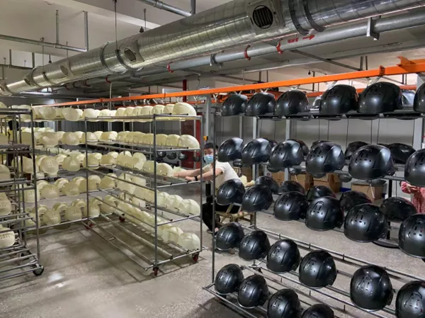 Automated helmet molding equipment after upgrade
